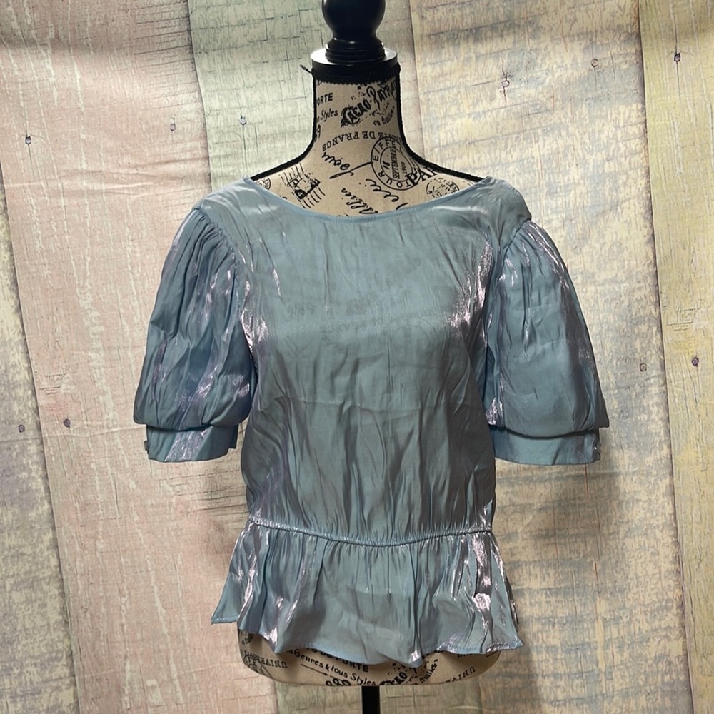 Brand new with tags Woman’s Francesca’s top. Size is XL.